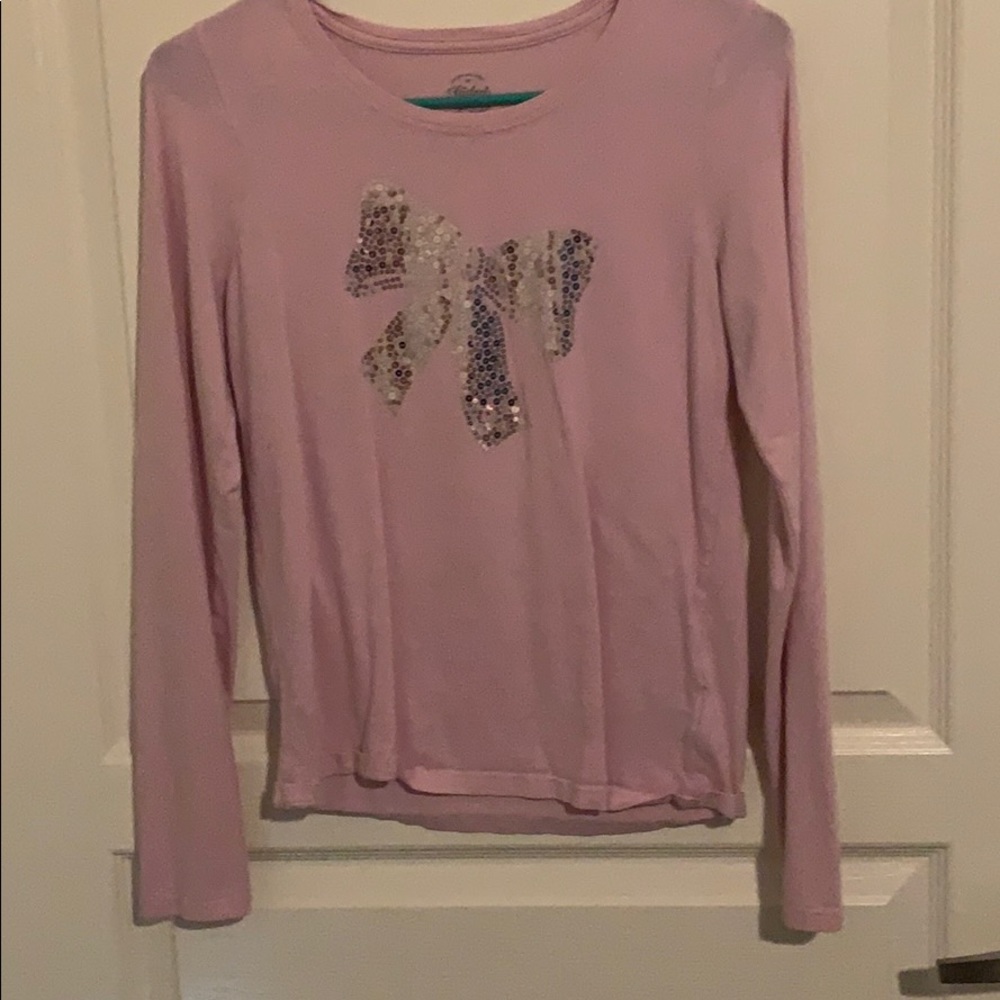 Pinkish purple long sleeve tee shirt.
